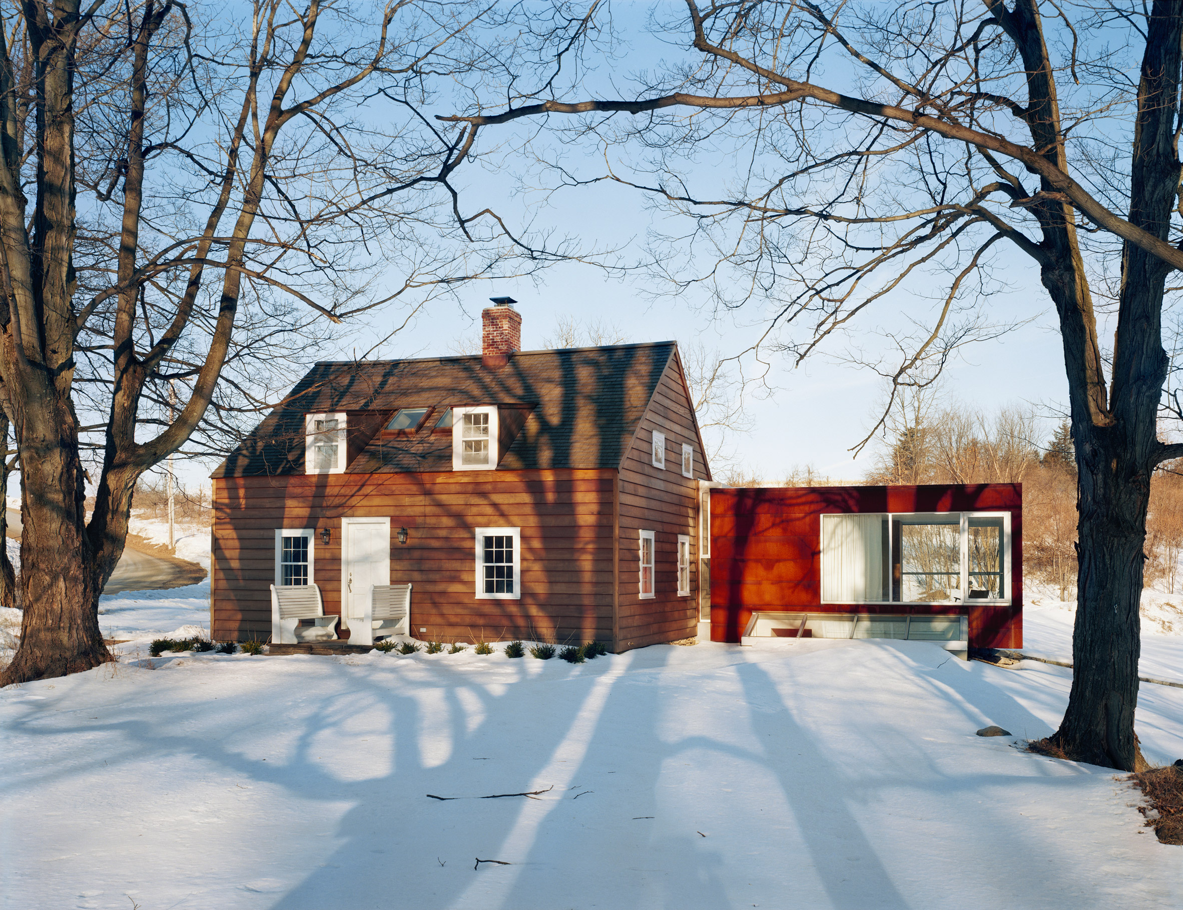 Messana O'Rorke Architects extends colonial New York homestead with weathering-steel annex-3