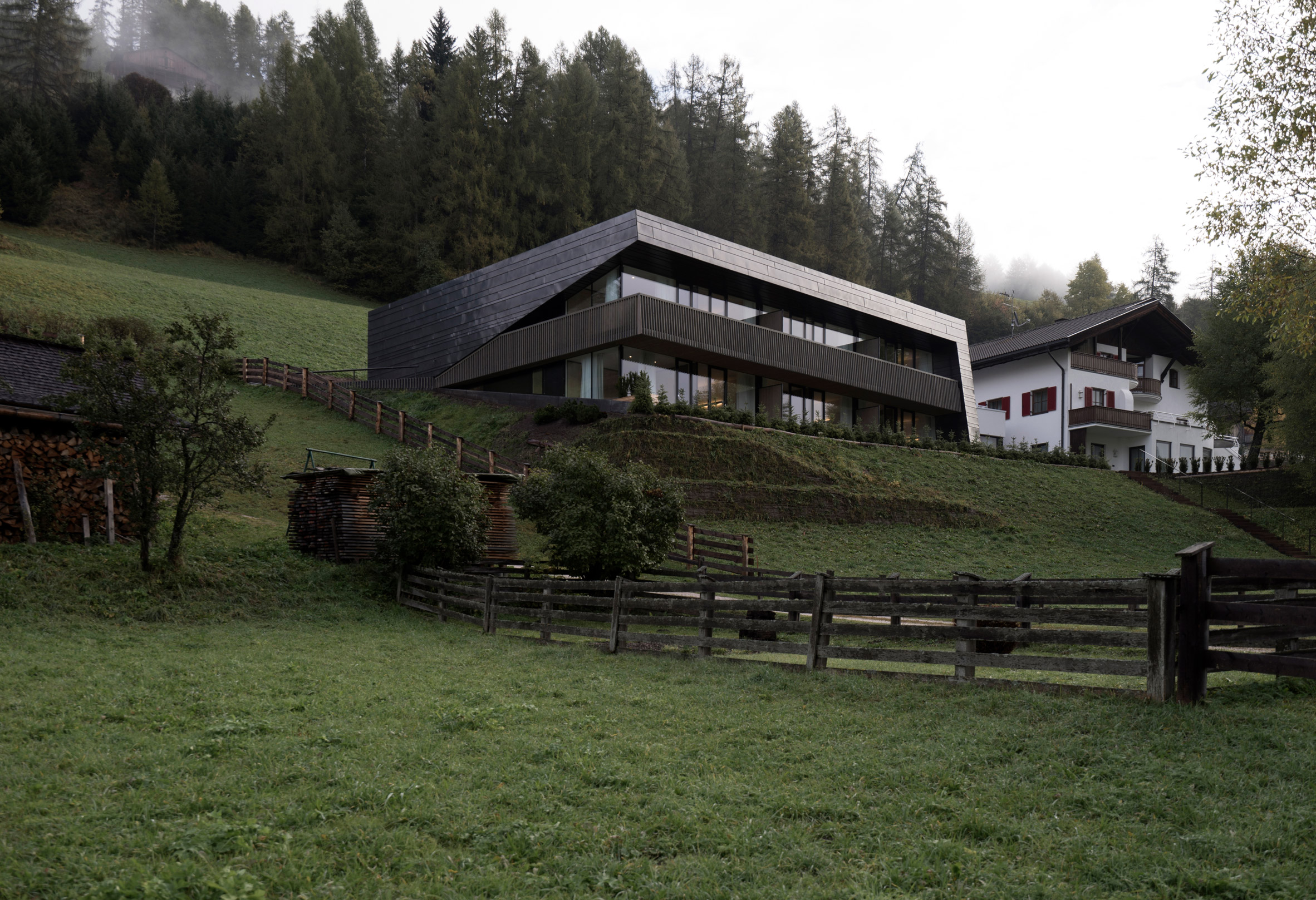 Plasma's copper-clad apartments have huge windows facing Dolomites-4