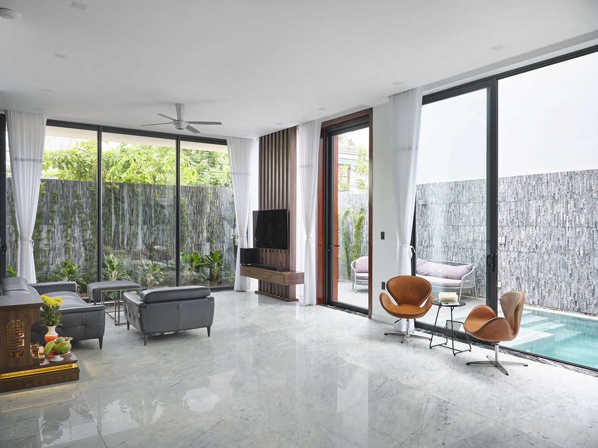 绿意盎然的三层别墅 | 和谐自然的生活空间-5