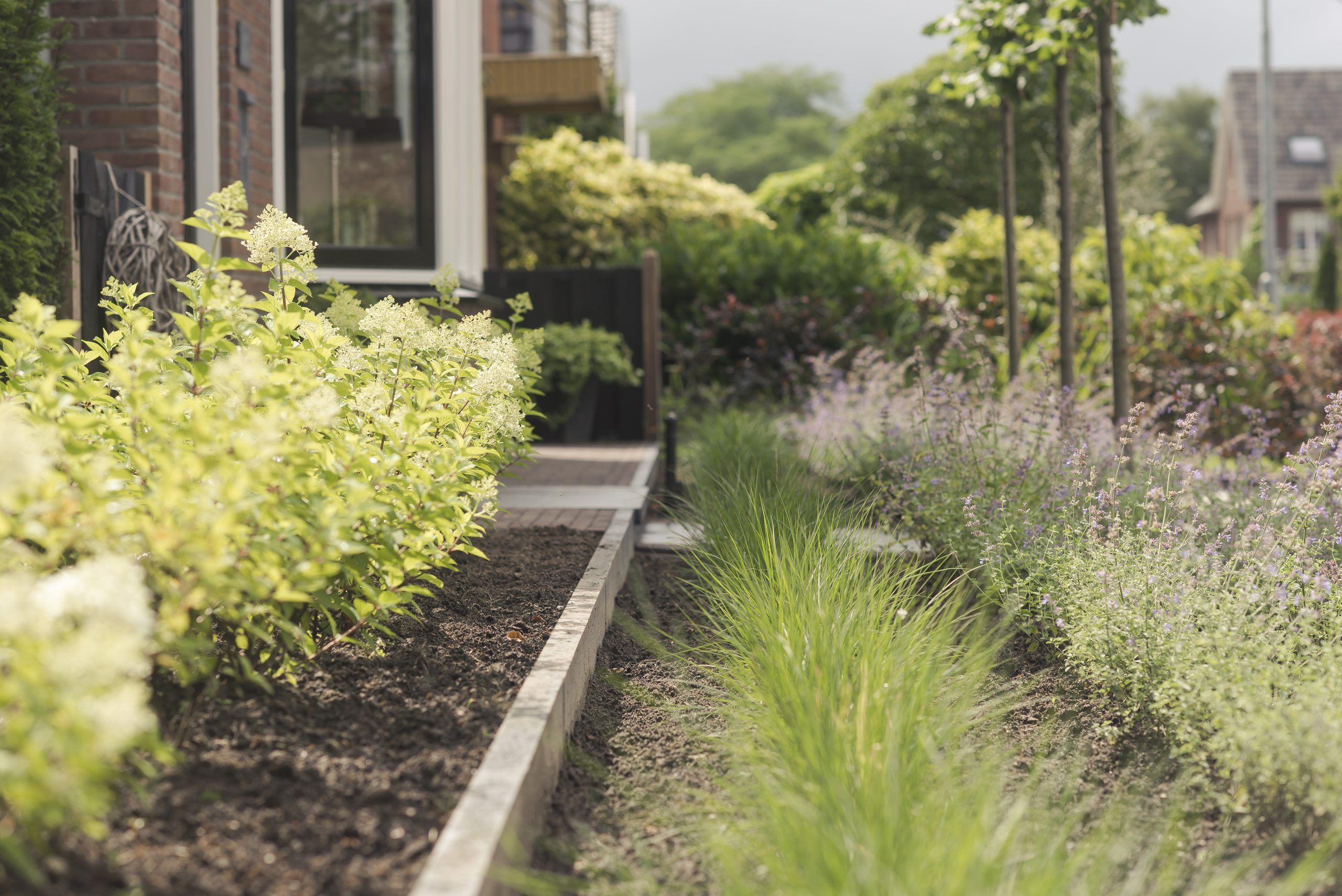 Landscaping with pond and veranda-13