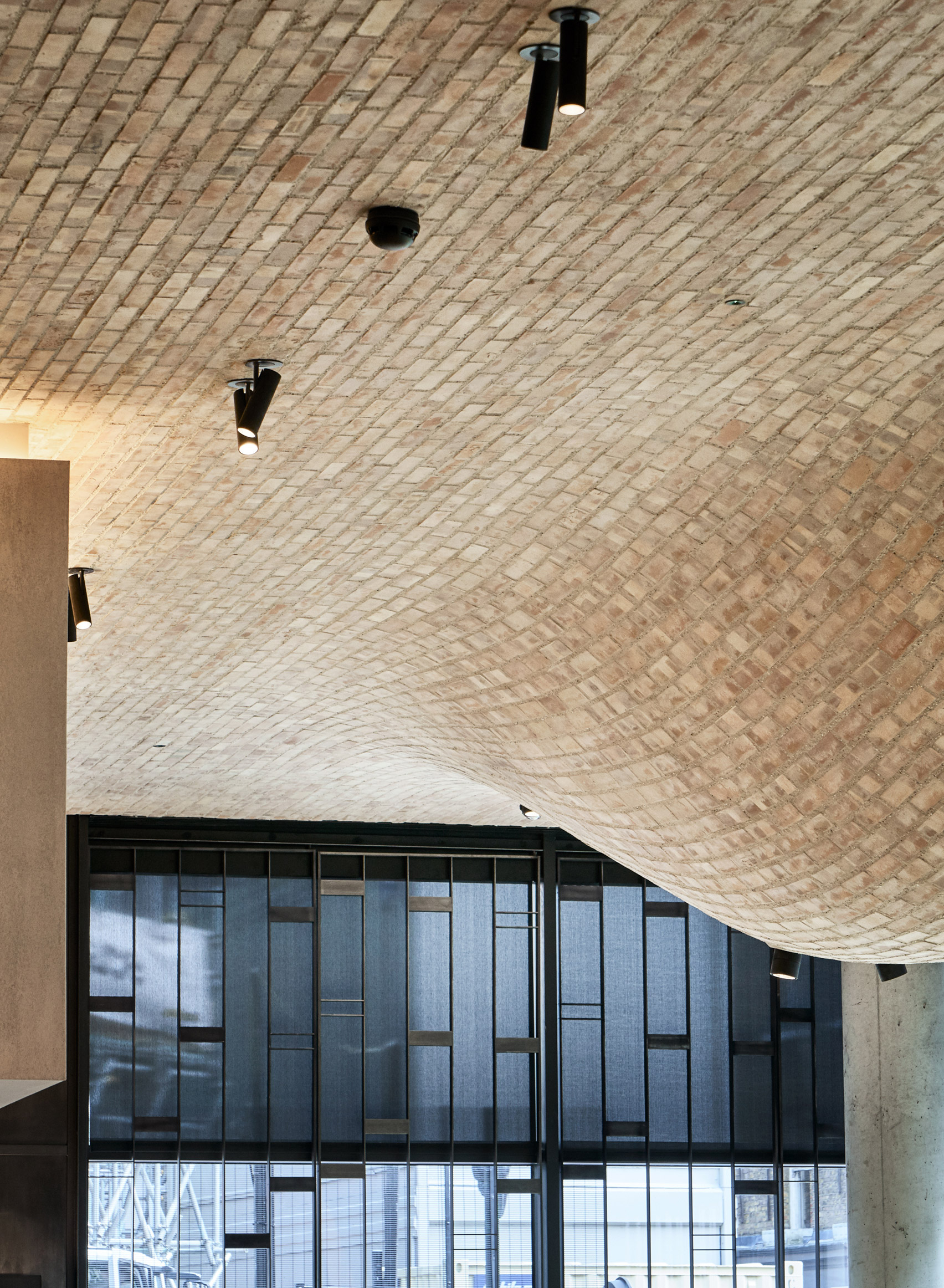 Brick bulges embellish ceiling of Fucina restaurant by Andy Martin Architects-10