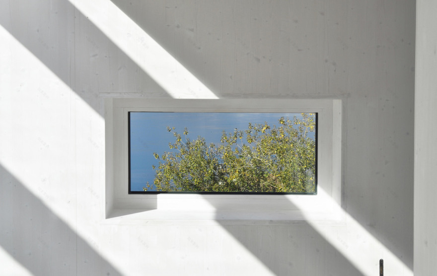 This prefabricated wooden holiday home is clad in charred timber boards-28