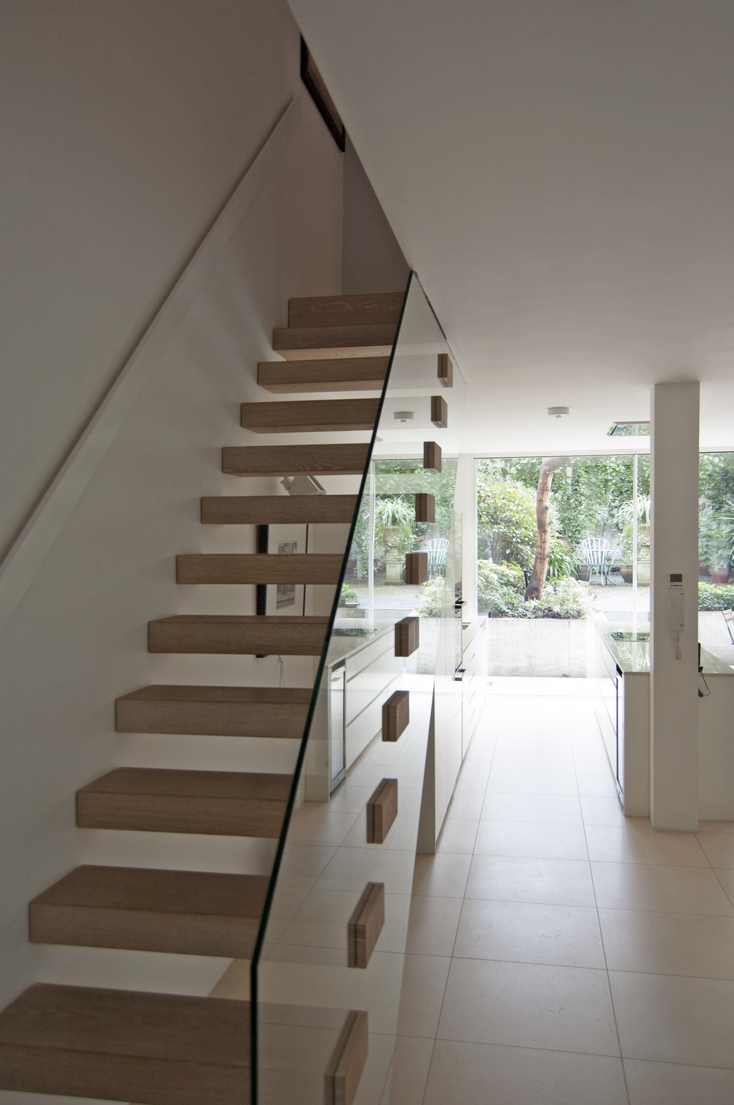 William Tozer adds white-walled living spaces to renovated Victorian house-14