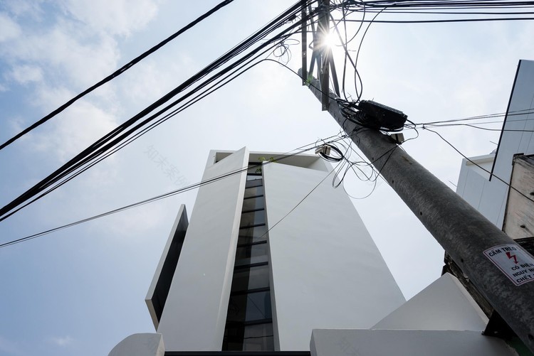 越南纸房子 | 城市拥挤空间的创意逃离-4