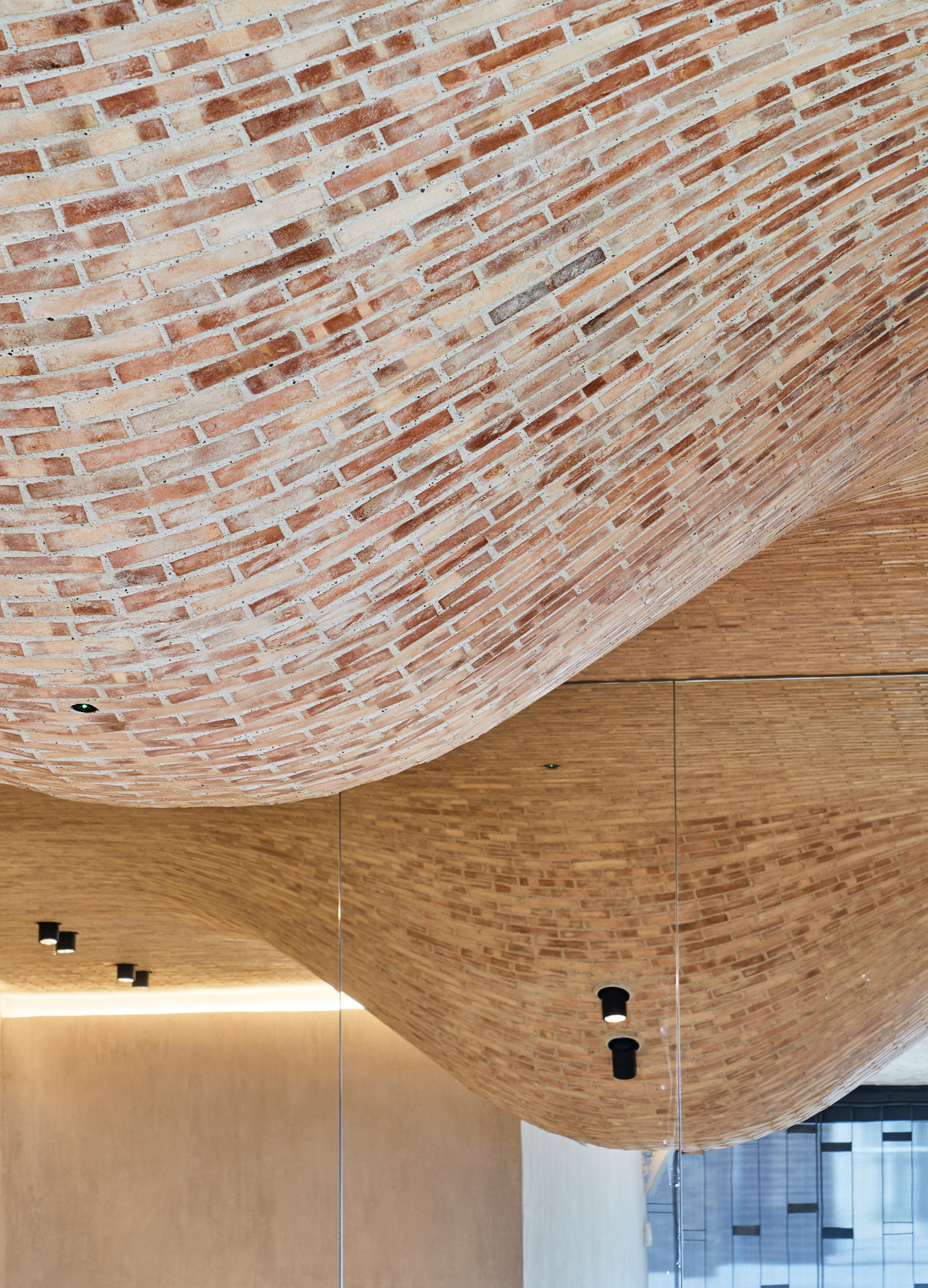 Brick bulges embellish ceiling of Fucina restaurant by Andy Martin Architects-2