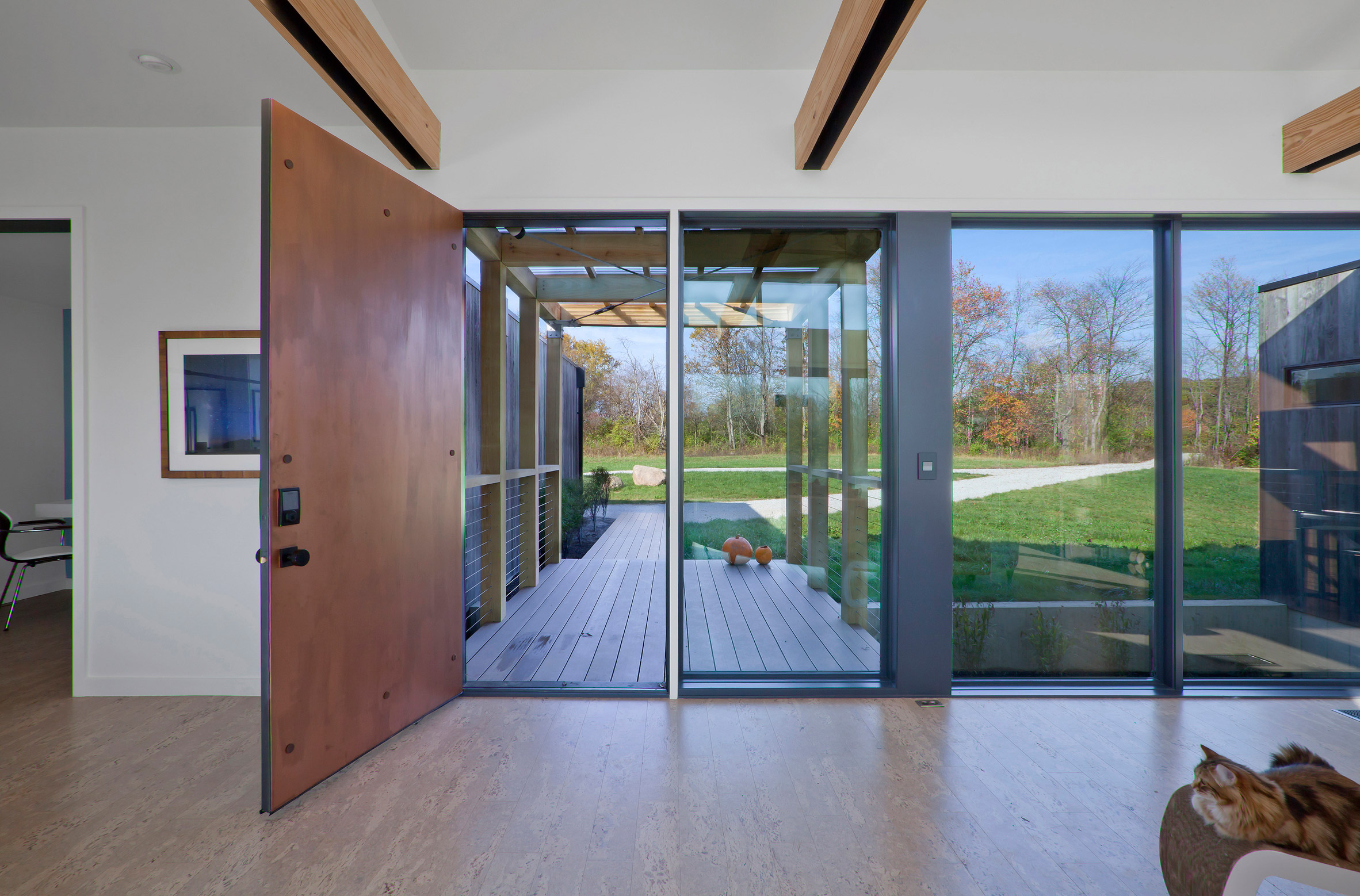 Haus wraps low-lying Indiana residence in thermally treated ash-15