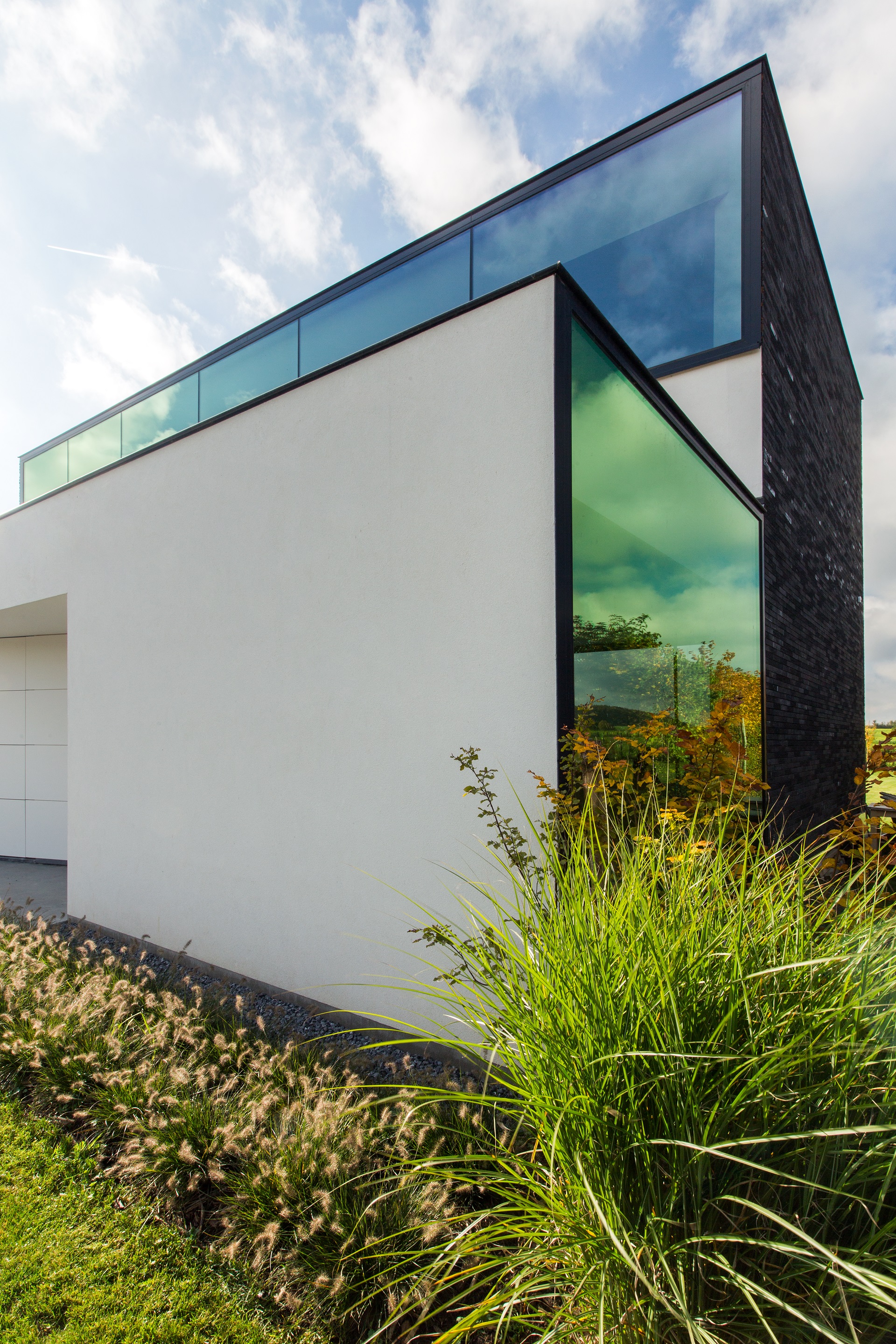 比利时比耶贝克新家庭住宅，简约生活与自然美景的融合-11