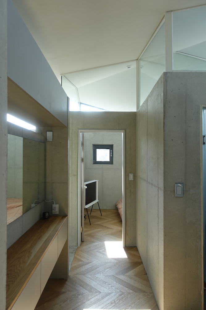 折纸式蝶形屋顶住宅-26