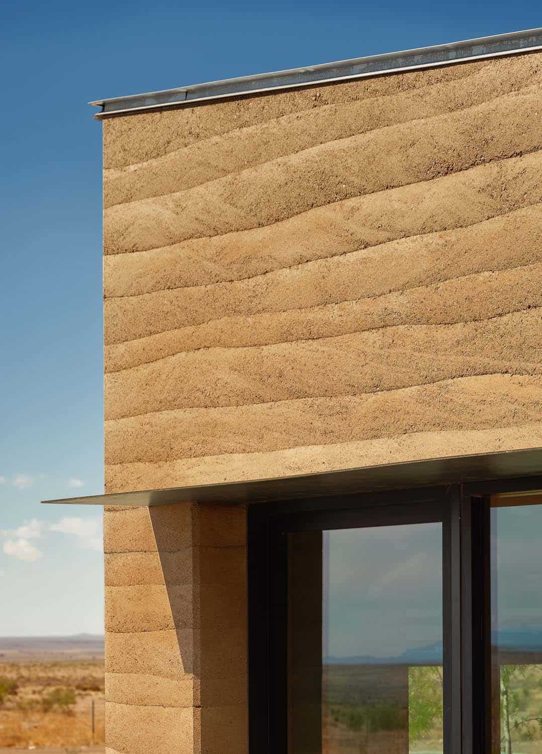 See this remarkable rammed earth house nestled on a Texas ranch-7