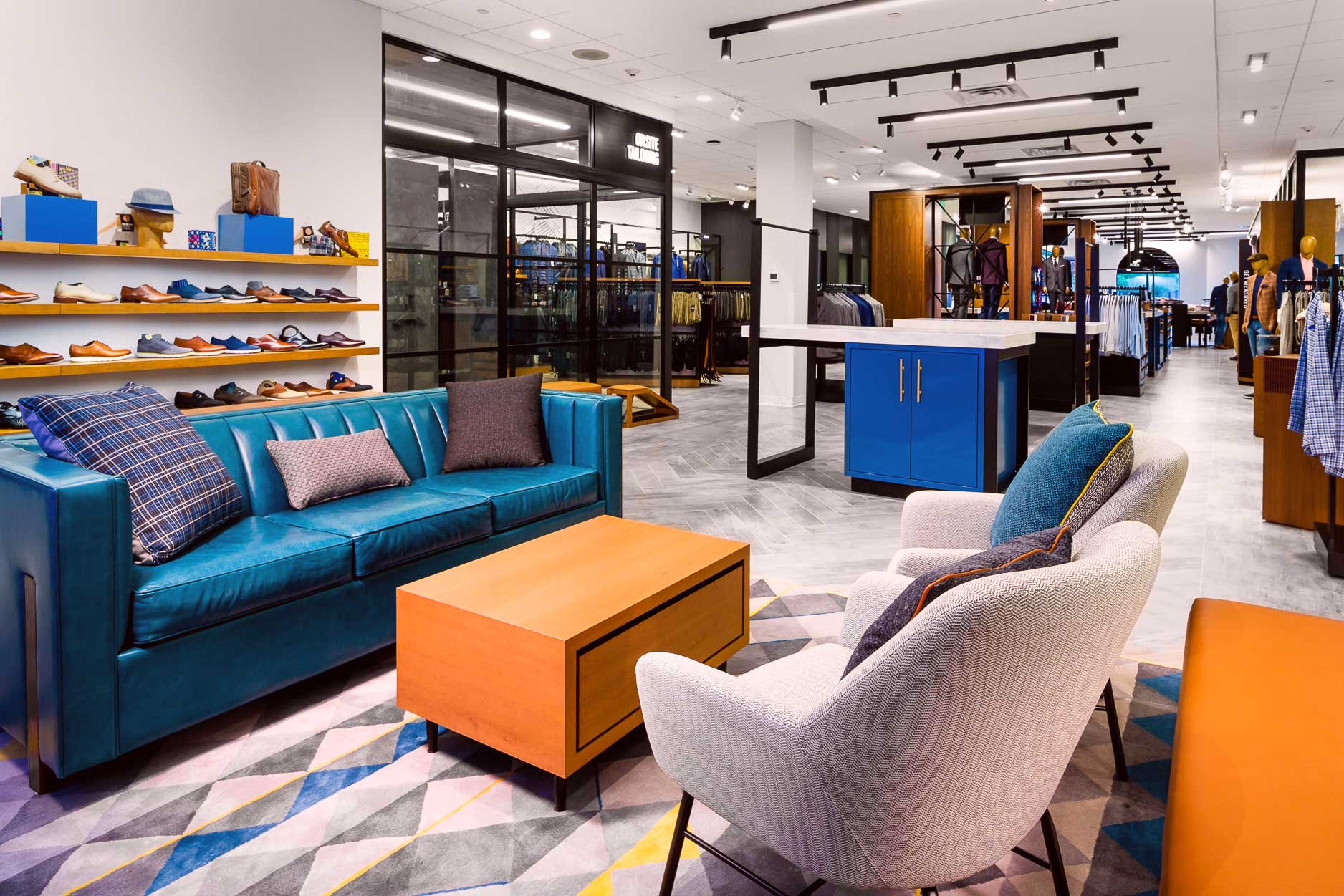 纳尔逊环球为男士服饰店设计新店铺概念-0