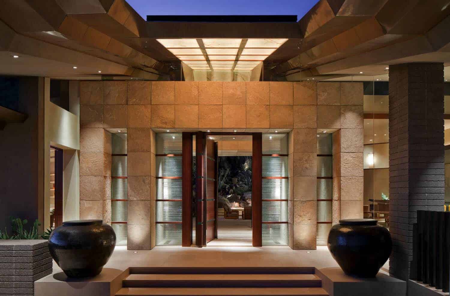 Modern desert home set on a rocky hillside with spectacular city views-3