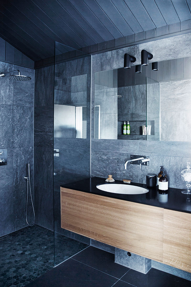 瑞典蓝绿色山间别墅,强调冬季美景-8