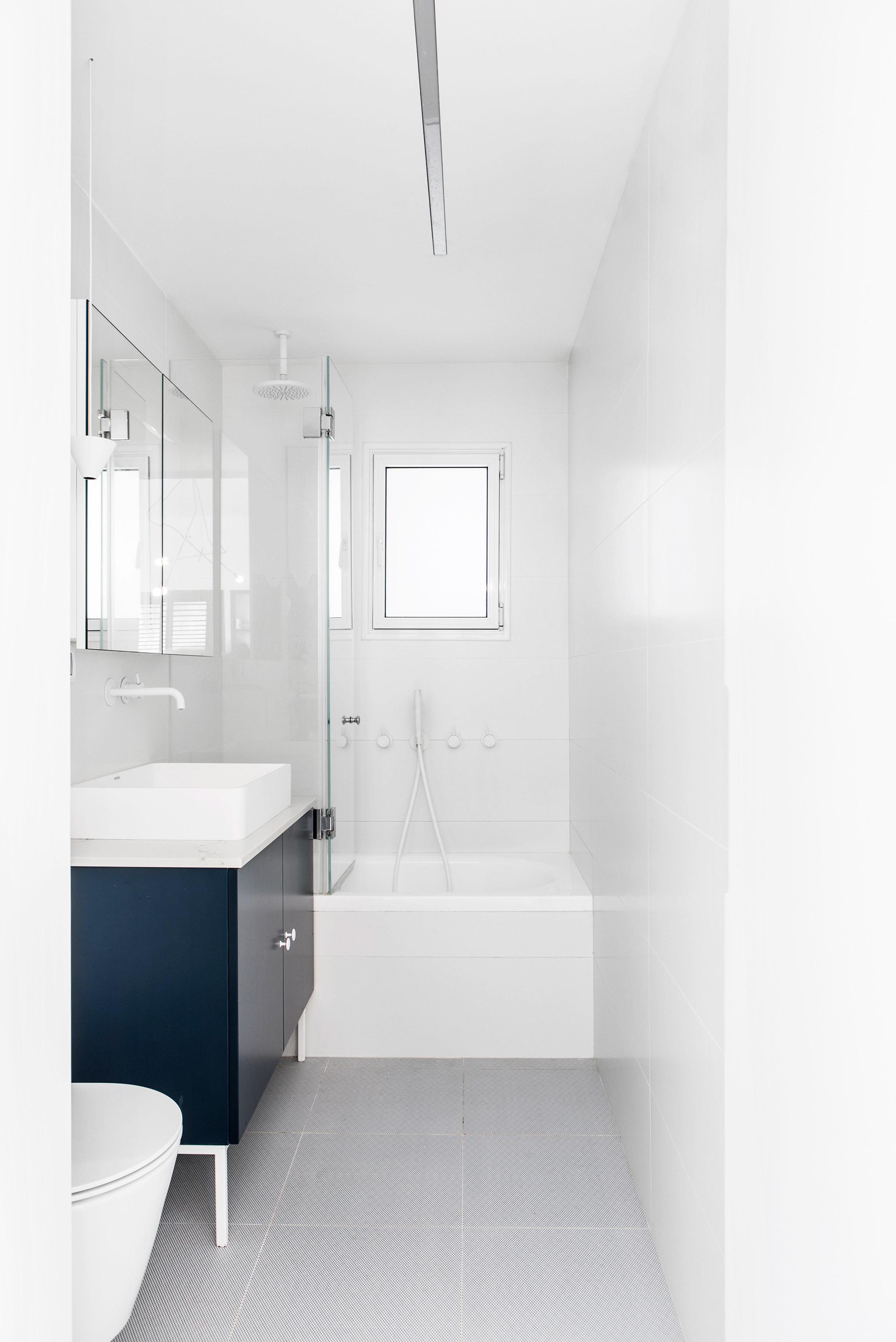 Maayan Zusman replaces walls with cabinets to save space in Tel Aviv home-24