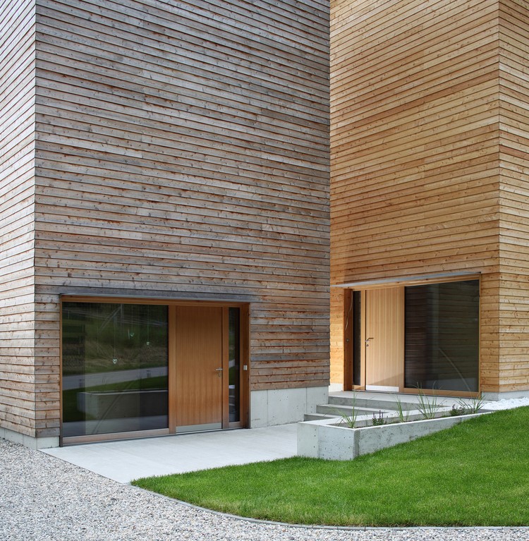 奥地利湖畔双塔木屋，诠释公共空间与隐私平衡-11