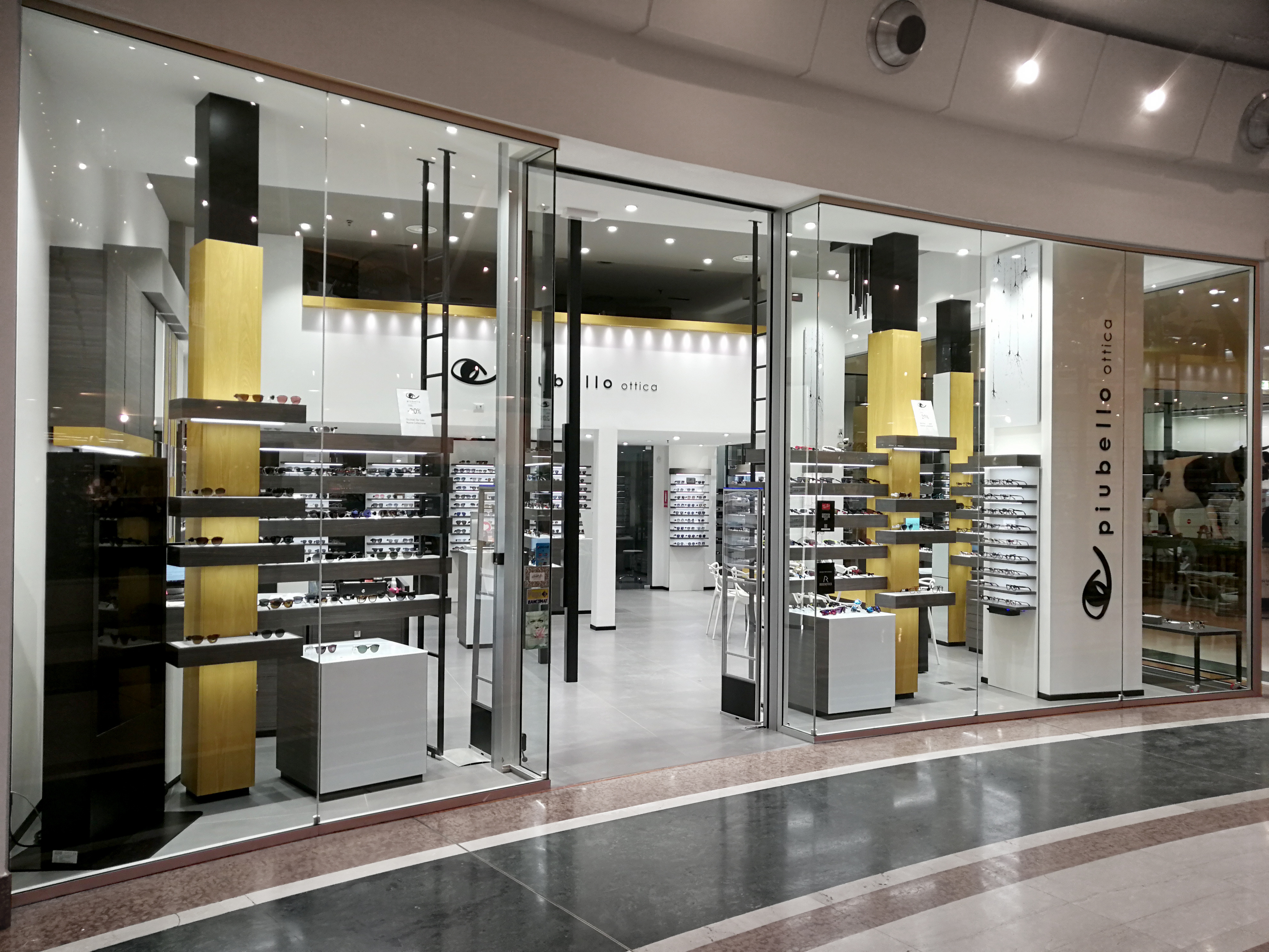 Ottica Piubello 购物中心的工业风设计-5