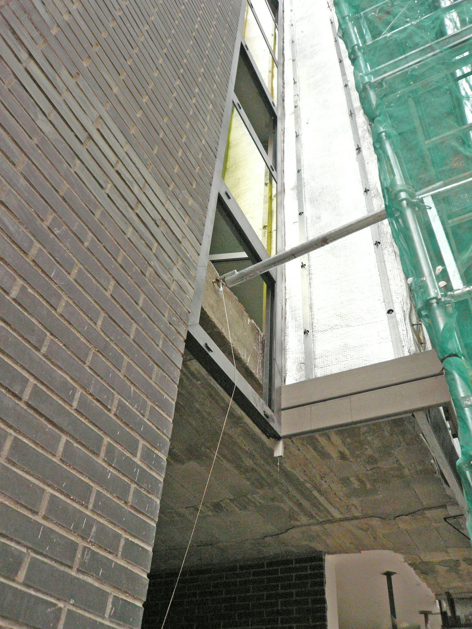 城市夹缝中的精致公寓楼-16