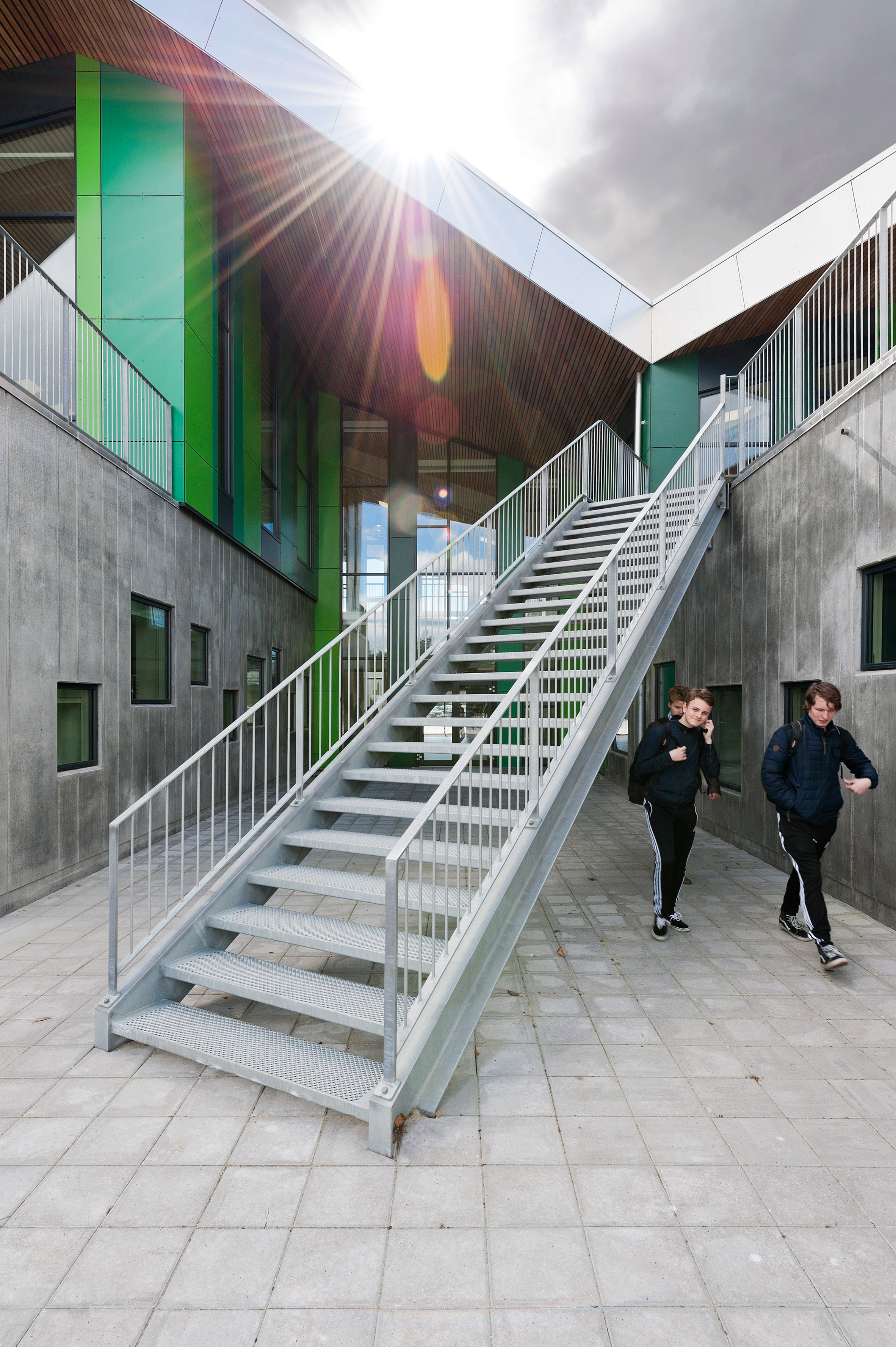 CEBRA completes Danish school with jagged roofs and stripy walls-18
