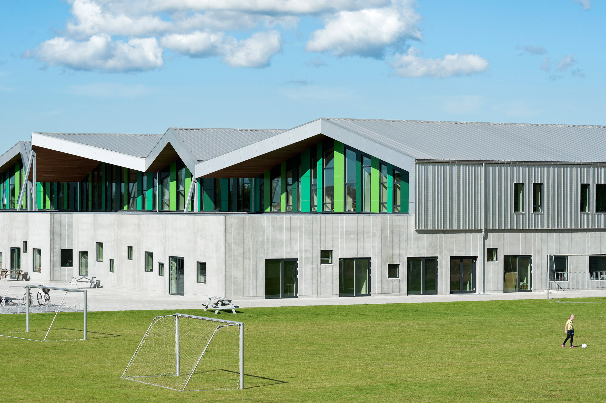 CEBRA completes Danish school with jagged roofs and stripy walls-23