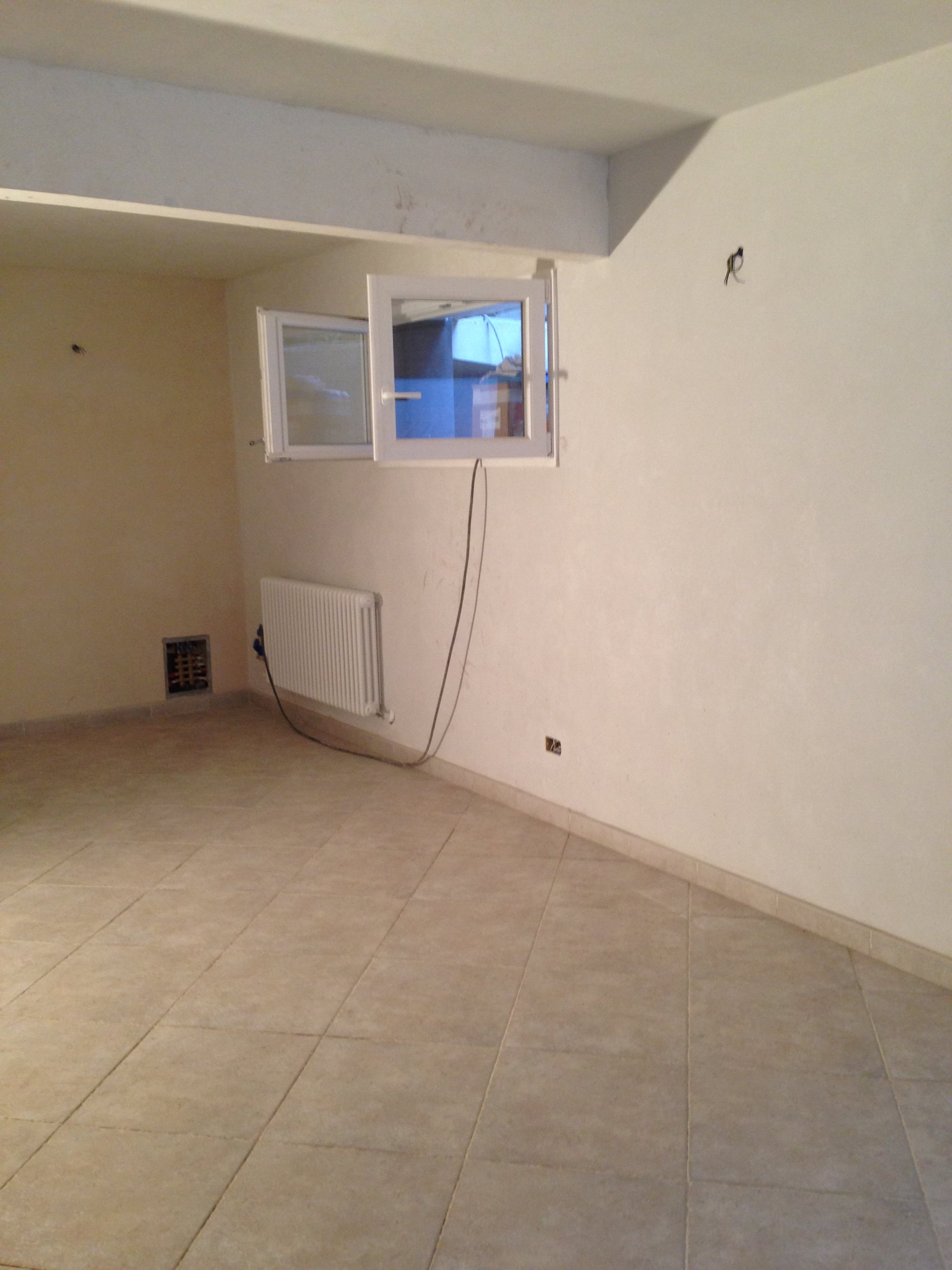 2015 年完成的地下室公寓重建与外部区域调整-15