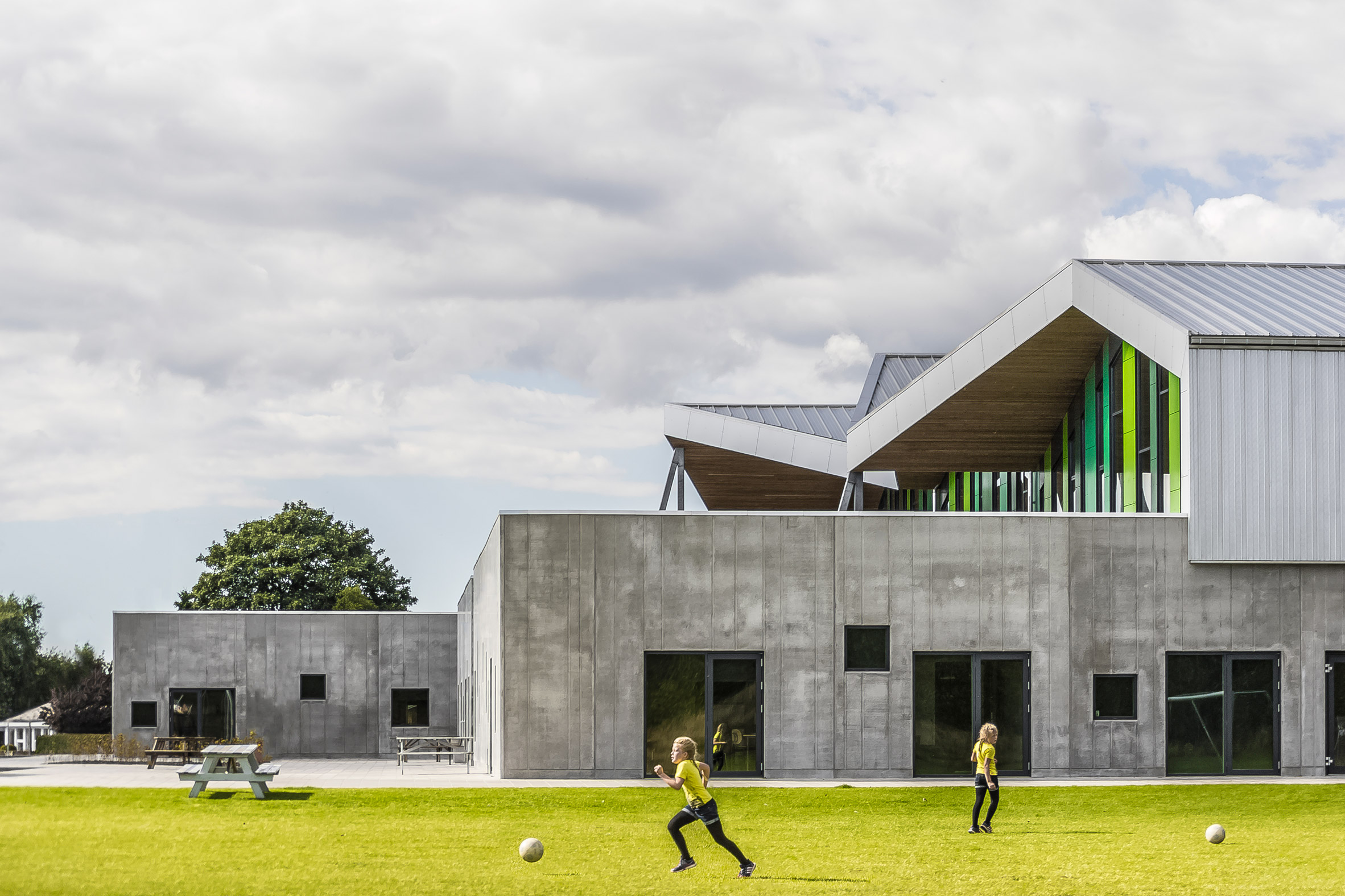 CEBRA completes Danish school with jagged roofs and stripy walls-21