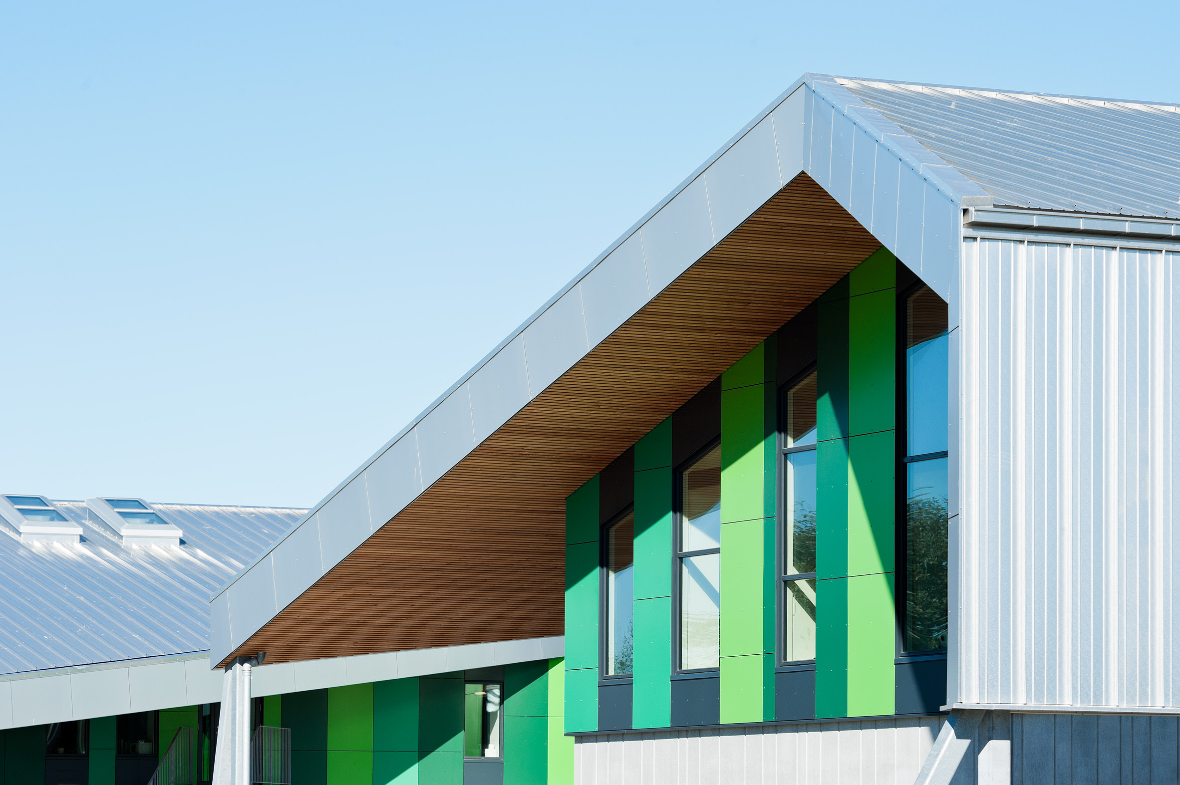 CEBRA completes Danish school with jagged roofs and stripy walls-13