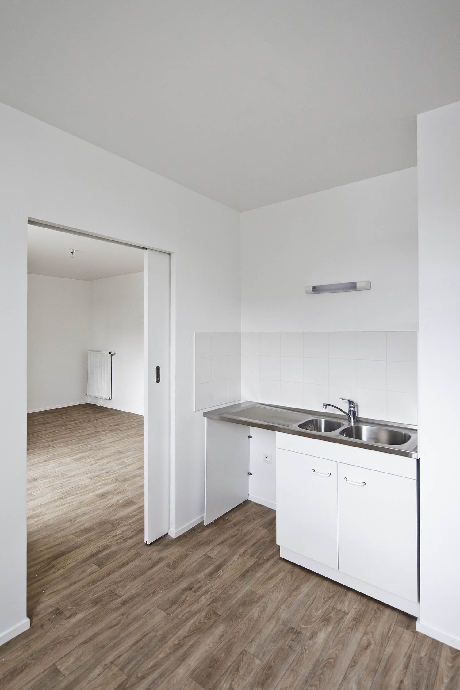 融入城市肌理的绿色住宅设计-15