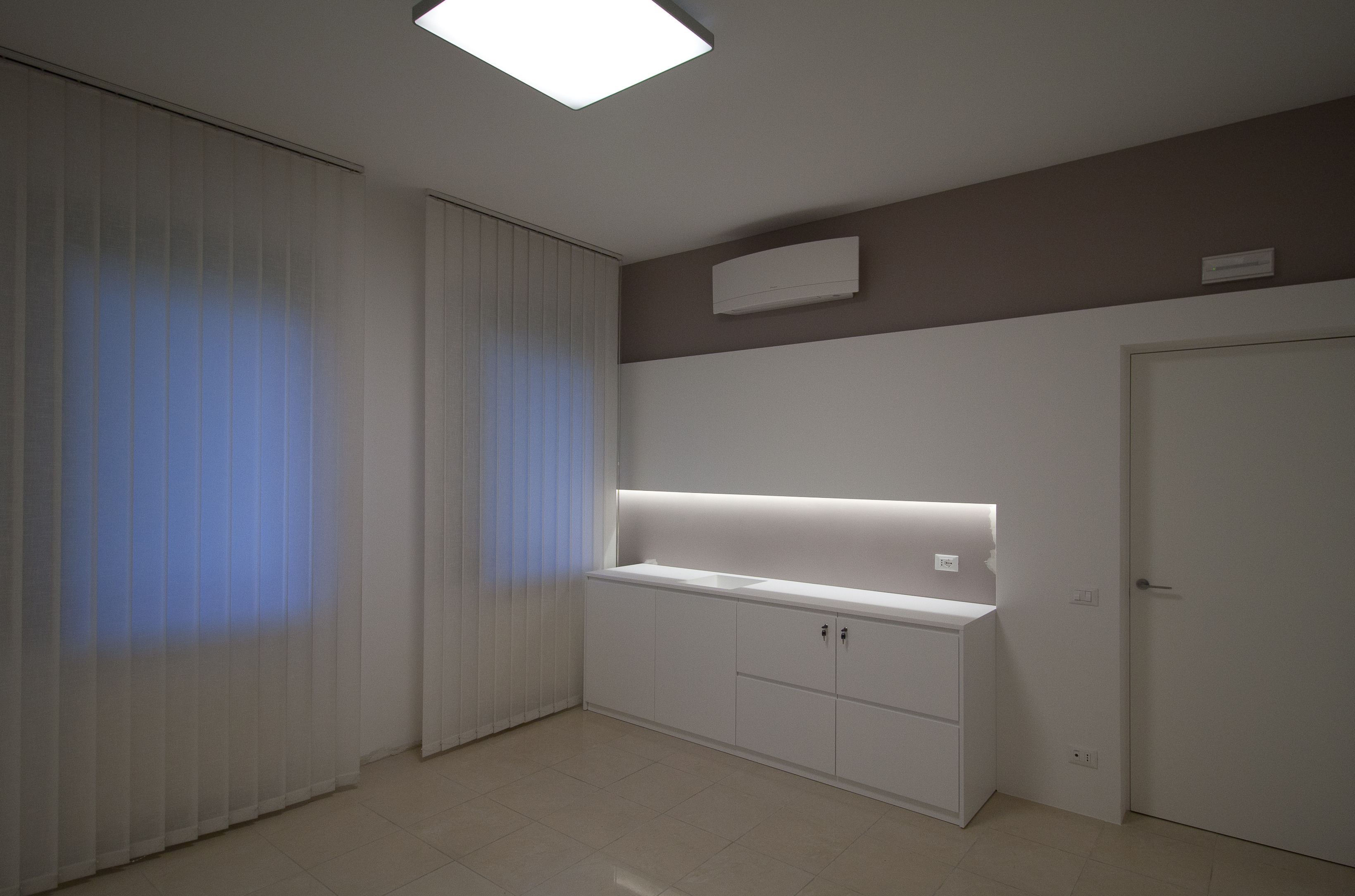 重塑空间，焕发生机——意大利 Treviso 商业空间改造-11