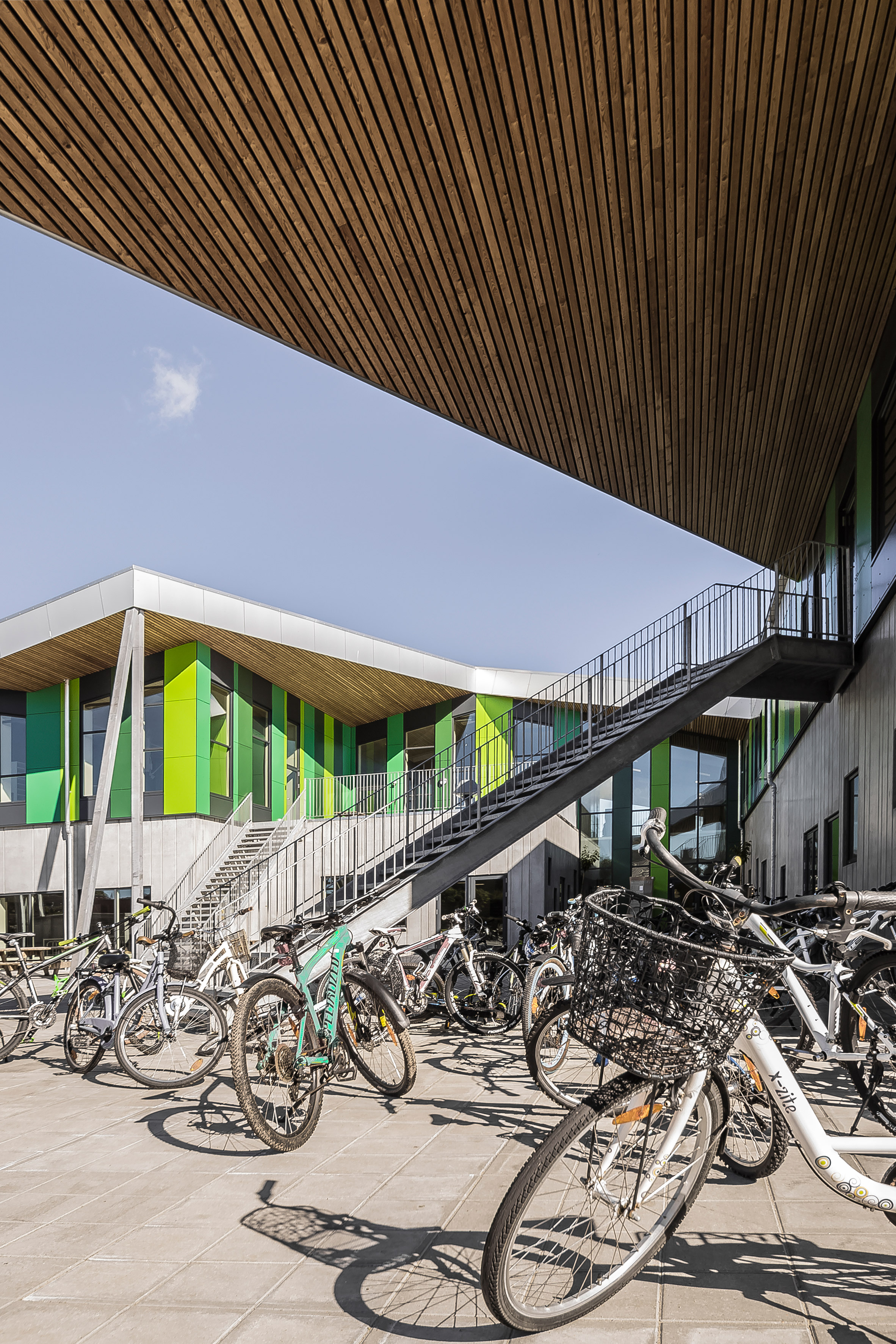 CEBRA completes Danish school with jagged roofs and stripy walls-16