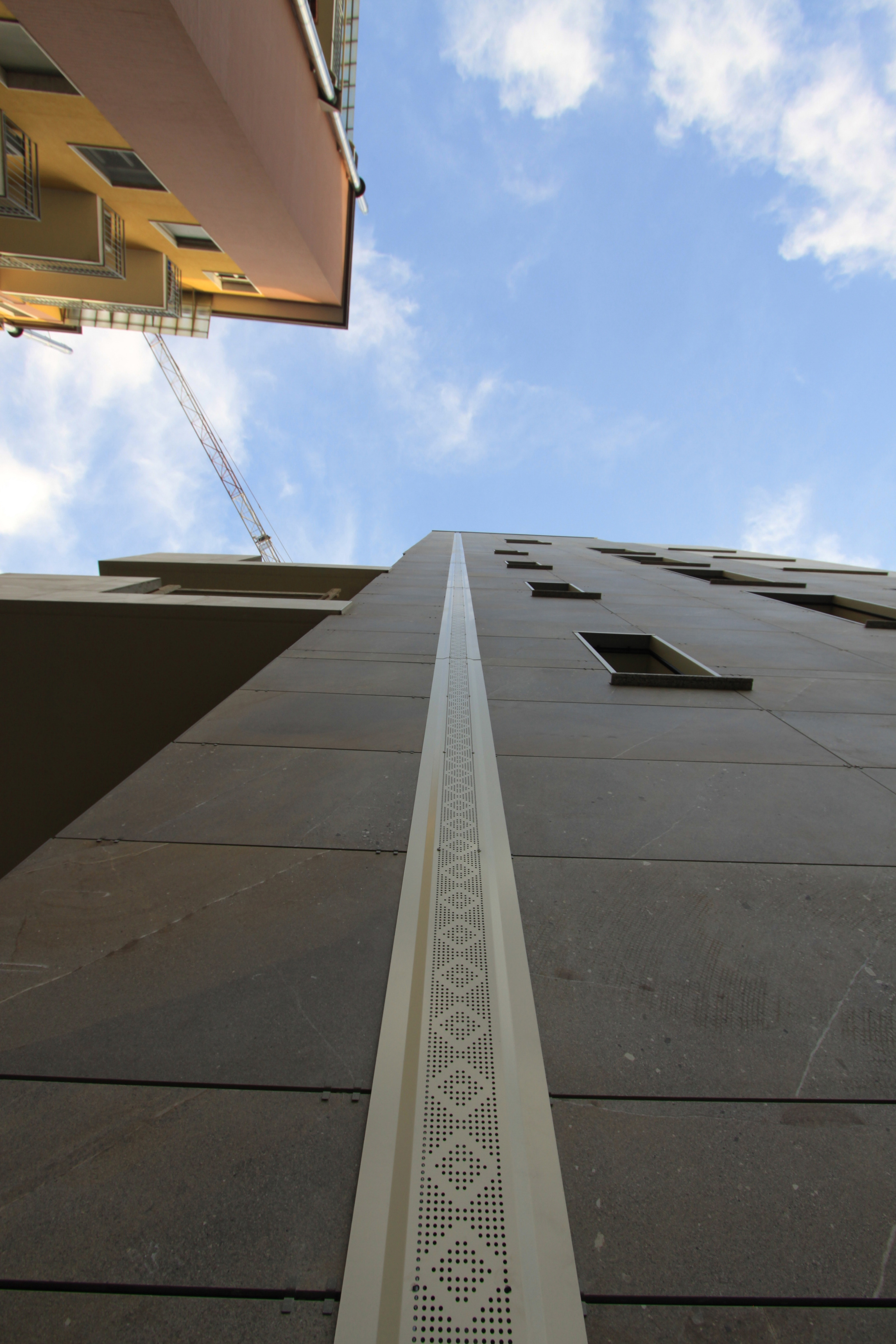 米兰 San Donato 新住宅楼,彩色瓷砖与保温系统的创新结合-2