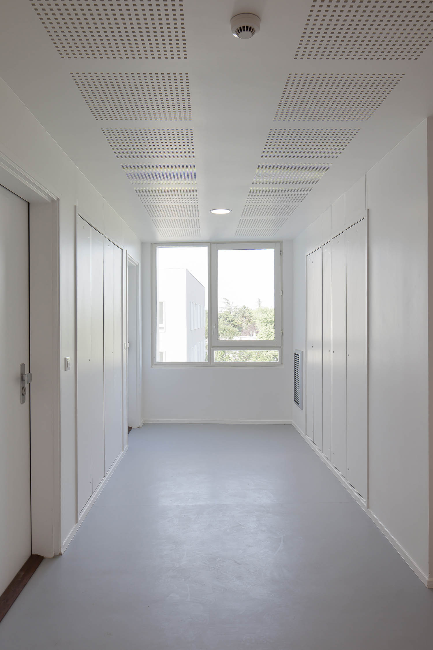 融入城市肌理的绿色住宅设计-11