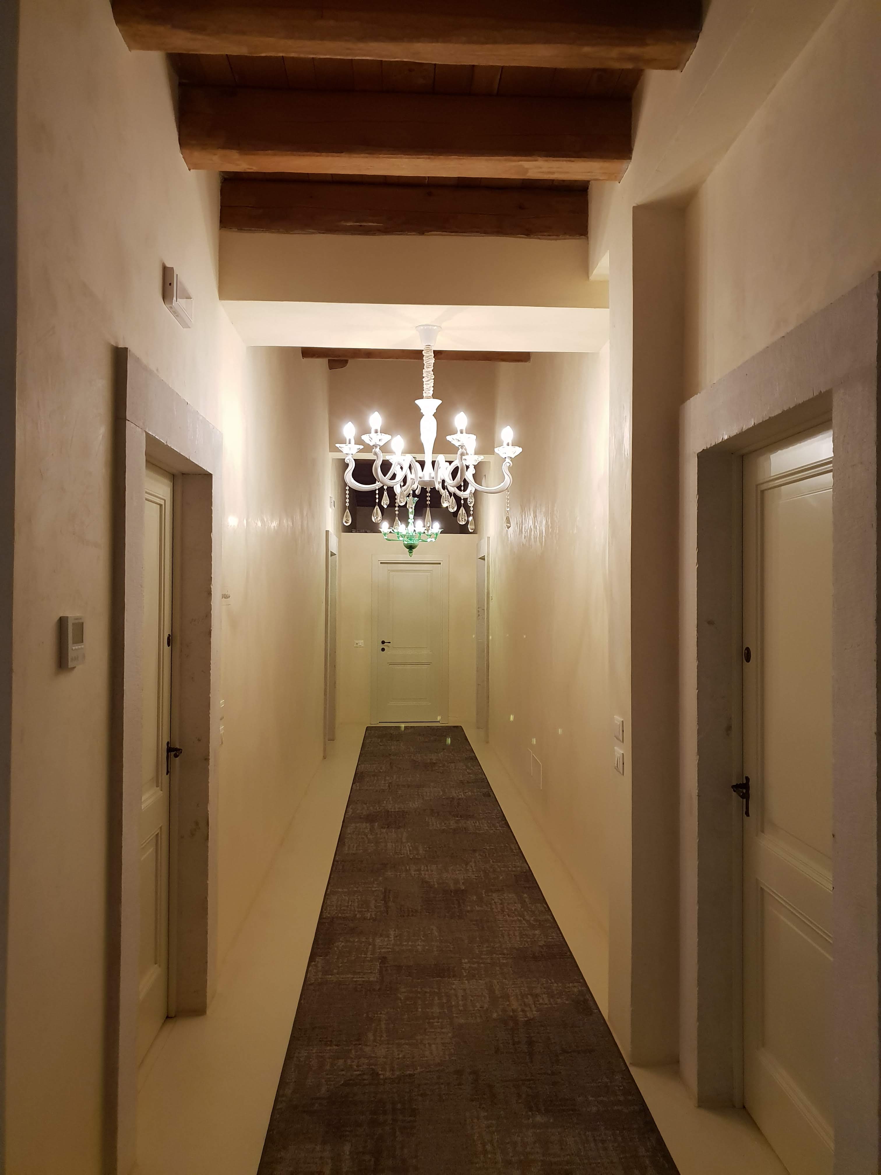 古韵与现代共融的意大利农庄酒店设计-11