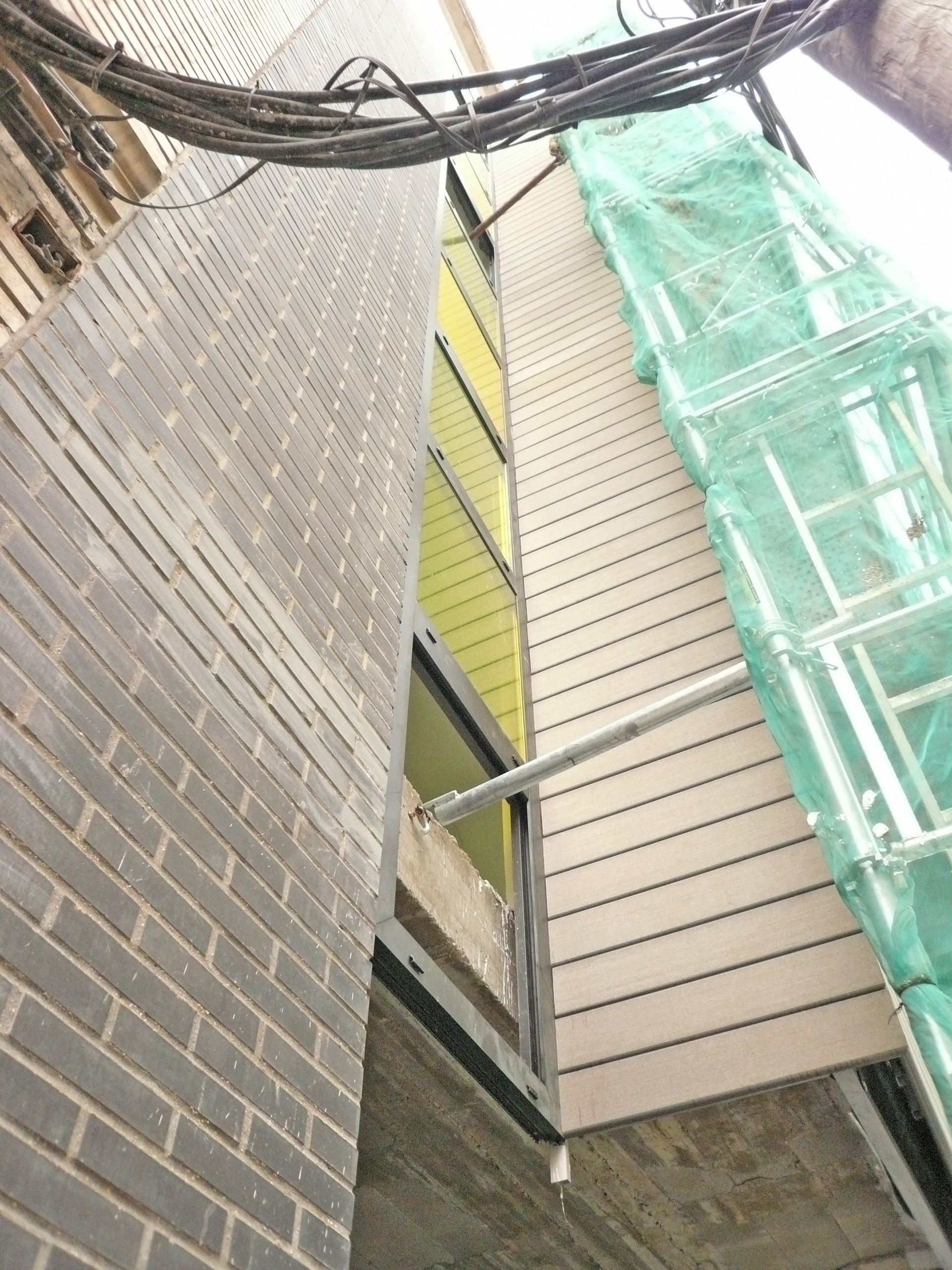 城市夹缝中的精致公寓楼-18