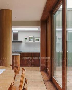 Green zinc panels "camouflage" Folded House in Cambridge by Westerdahl